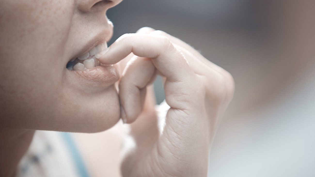 Crying woman in crisis. Close-up indoors portrait